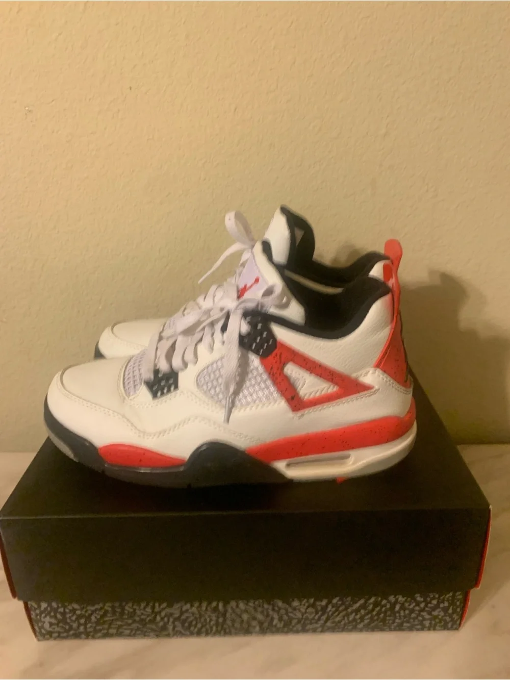 Jordan Retro 4 Sneakers in White/Red/Black